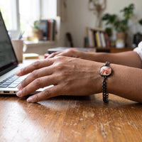 Thumbnail for The black octagon photo bracelet on her wrist, showing its real small size | SKU: TPH-OCTB-BLACK-18