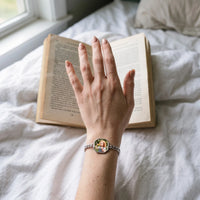 Thumbnail for The silver octagon photo bracelet on her wrist, showing its real small size | SKU: TPH-OCTB-SILVER-18
