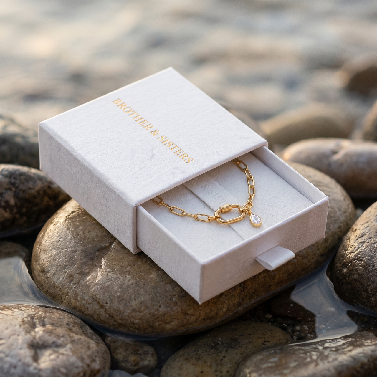 Carabiner Anklet in Brother & Sisters gift box on beach