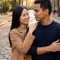 Thumbnail for Heart Bond Matching Bracelet Set in Silver — her hand resting on his shoulder, both bracelets visible