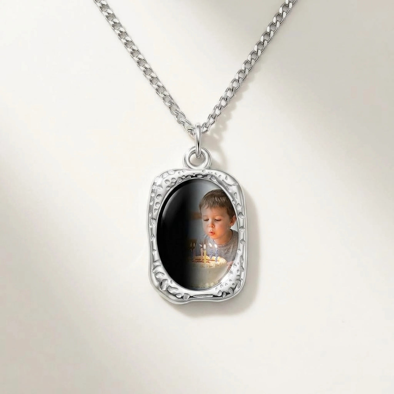 Secret Oval Photo Necklace in silver, black oval pendant turning into a hidden photo when warmed | SKU: TPH-OVLN-SILVER