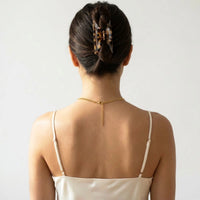 Thumbnail for Back of the neck showing the lobster clasp and extension chain of the gold photo necklace | SKU: TPH-RNDN-GOLD